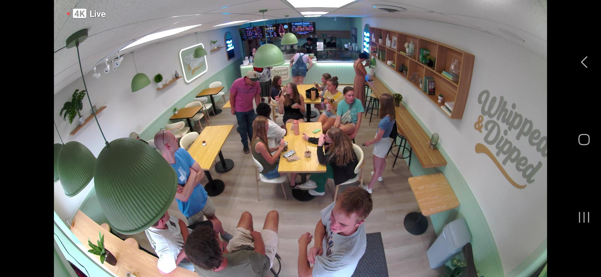Busy interior of Whipped and Dipped dessert café in Big Rapids